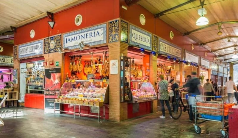 Seville: Tasting, History, Market visit and Tapas Tour - Tapas among old earthenware vats