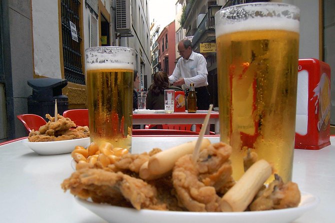 Sevillian tapas tasting on a bicycle (3 bars-3 tapas-3 drinks) - Why this Seville food tour works