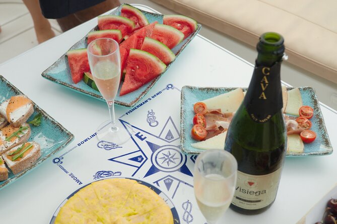 Shared Luxury Yacht Cruise with Champagne and Tapas - Spanish tapas and free-flowing drinks