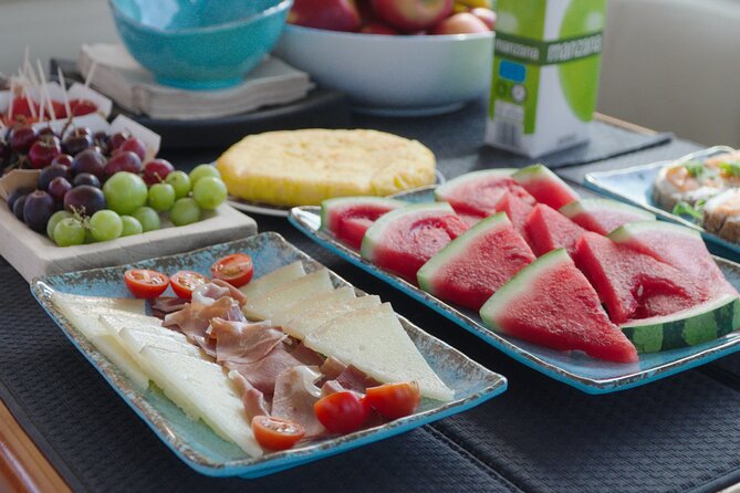 Shared Luxury Yacht Cruise with Champagne and Tapas - Relaxing on deck between activities
