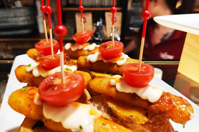 Spanish Wine and Tapas Tour in a Local Neighborhood in Barcelona - Four bars, four different tastes of Spain