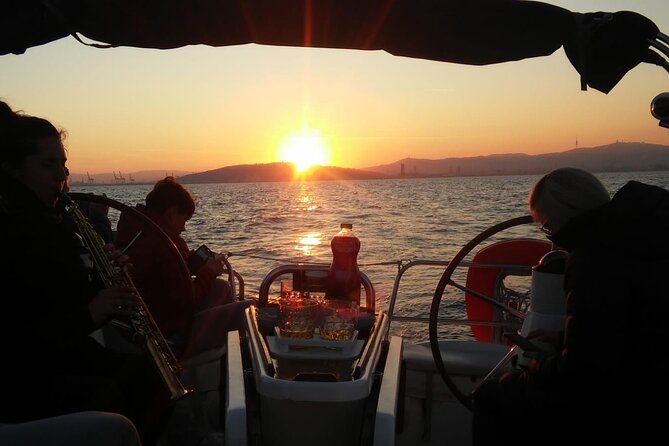 Sunset Sailing Experience with Live Sax Music and Spanish Tapas - Spanish tapas, cava, and easy conversation