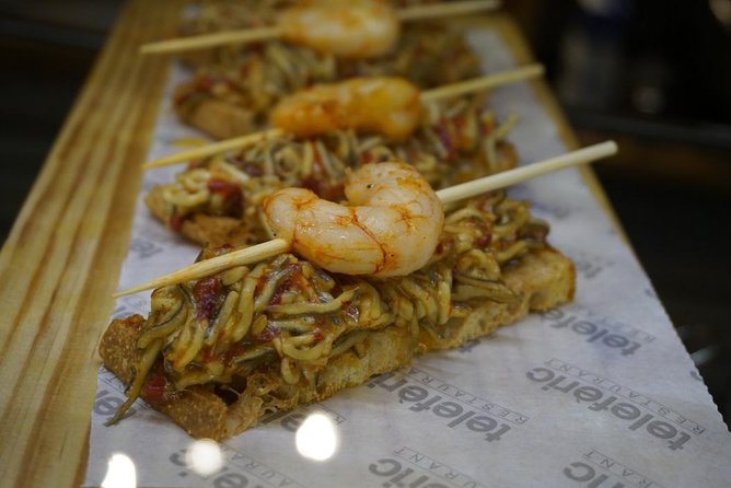 Tapas like a local Private Tour in Barcelona - Three bars, from pinchos to Catalan dessert