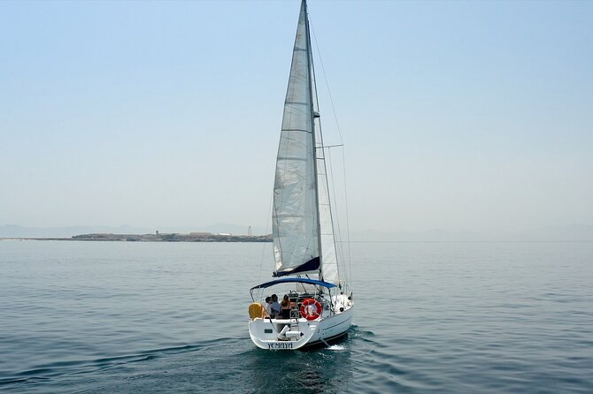 Tarifa Sailing and Snorkeling Excursion with tapas and drinks - Snorkeling with fins, a wetsuit, and an underwater scooter