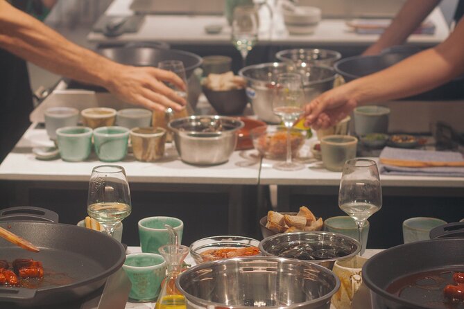 Taste of Spain: Tapas Cooking Class with Bottomless Wine Pairing - From cooking station to private dining room