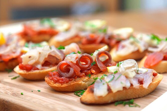 Tasty Tapas & Drinks Tour with a Rooftop Included - Madrid tapas with a neighborhood-by-neighborhood route