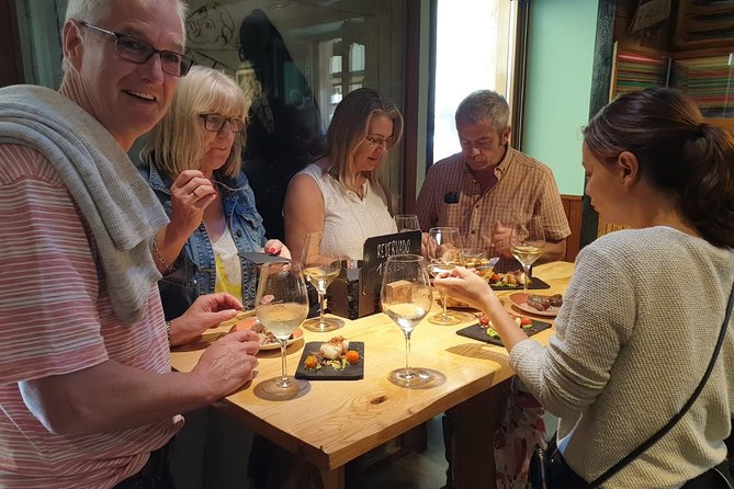 The Best Gourmet Experience and Pintxo Tour in San Sebastian - Bar three: finishing with food, drink, and advice