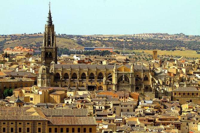 Toledo Tour with Tapas, Wine Tasting and Optional 3 Monuments - Plaza de Zocodover begins the walking tour