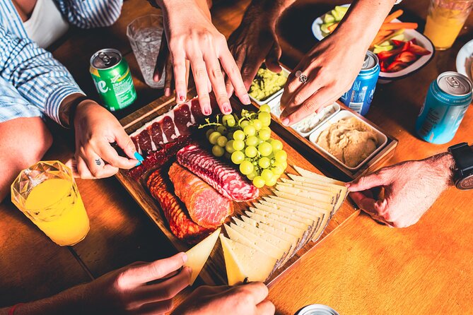 Traditional Mallorquin Llaut Cruise with Tapas and Drinks - Swimming, snorkeling, and the floating platform