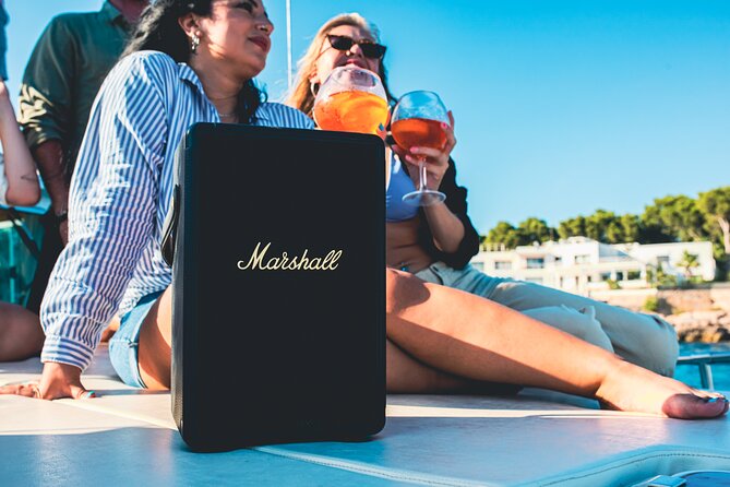 Traditional Mallorquin Llaut Cruise with Tapas and Drinks - Booking, weather, and cancellation details
