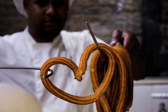 Try Madrid Best Churros, Tapas & Market by FLT - Tortilla, Iberian ham, and the market stop