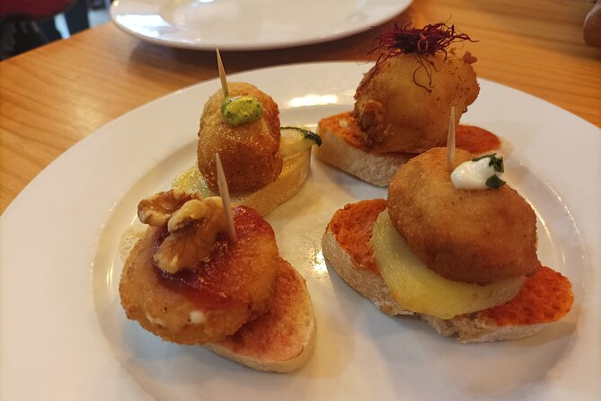 Valencia Food Tour: Tapas, Drinks and Delights with a Local - Starting with esgarraet at Plaça del Comte de Bunyol