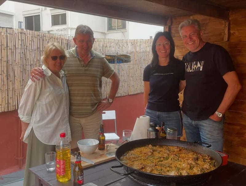 Valencia: Paella Cooking Class with Tapas and Drinks - Eating the finished paella