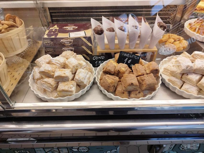 Valencia: Street Food Tour including Paella & Tapas Tasting - Ending with Valencian paella