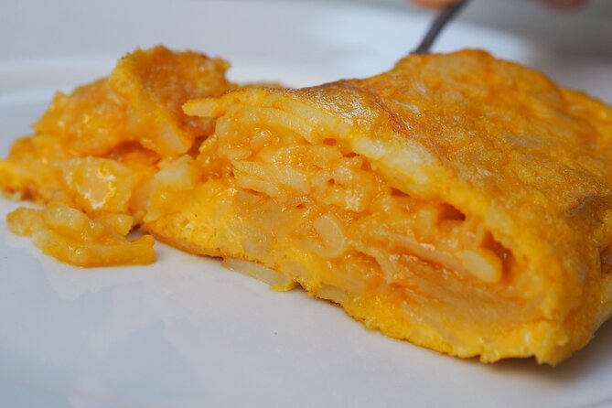 Valencia Tapas Crawl by Food Lover Tour - Stop one: tortilla, jamón, and Valencian cheese