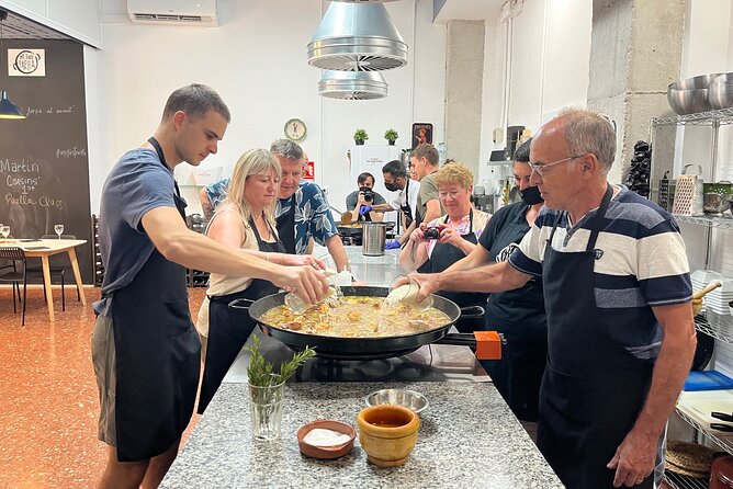 Valencian paella cooking class, tapas and visit to Ruzafa market. - Making Valencian paella with chicken and rabbit