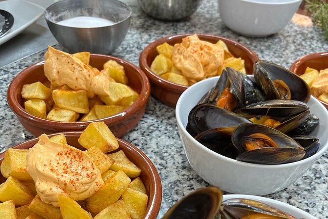 Valencian paella cooking class, tapas and visit to Ruzafa market. - The meal after the pan comes off the heat