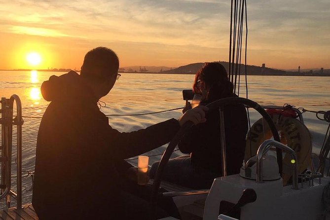 Wonderful 2 Hour Sailing trip including open bar and Pinchos - Port Vell brings ships, ferries, and city views